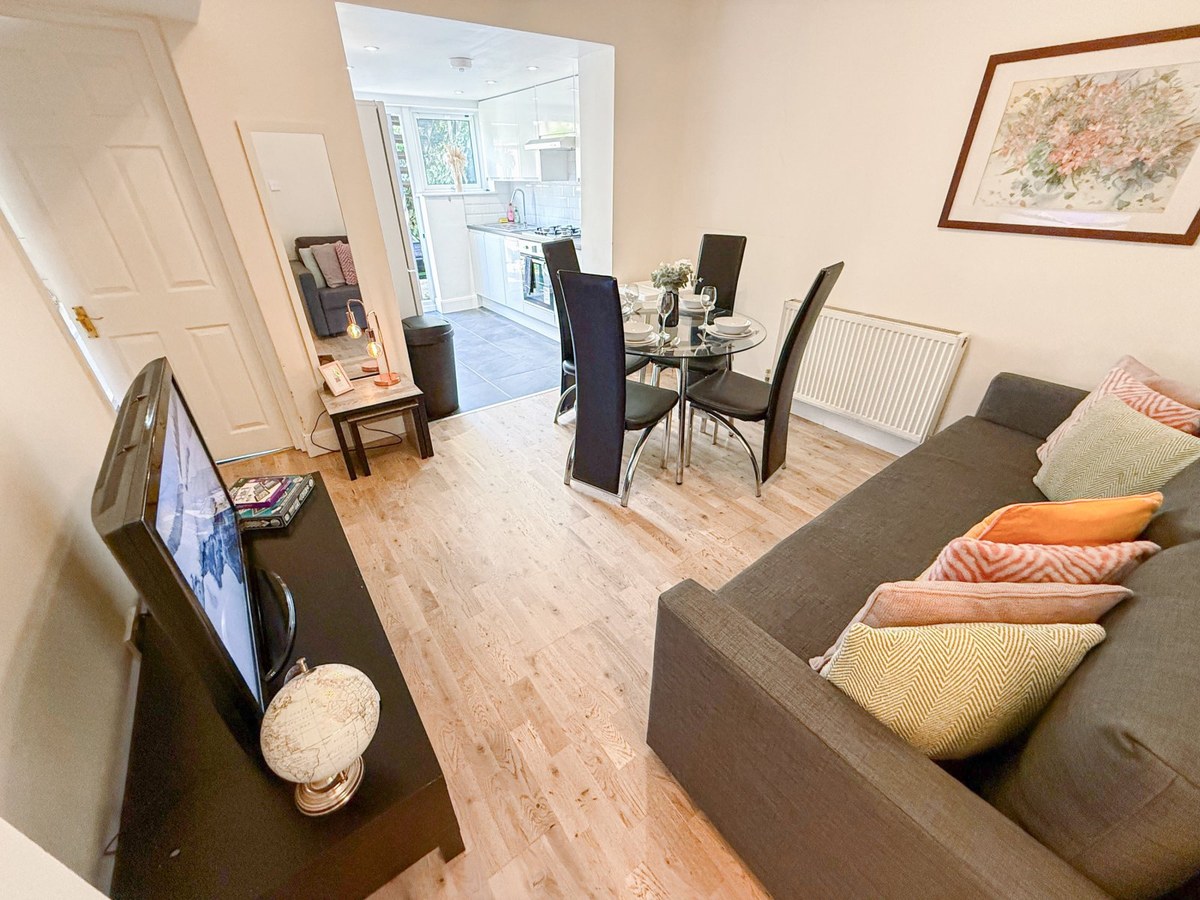 Sofa and dining table in an open-plan living space