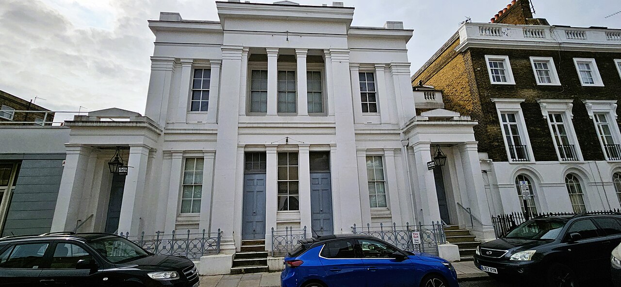 The white classical facade and entrance of the Almeida Theatre